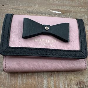 Kate spade wallet with 5 pockets lot of space,very few times used
